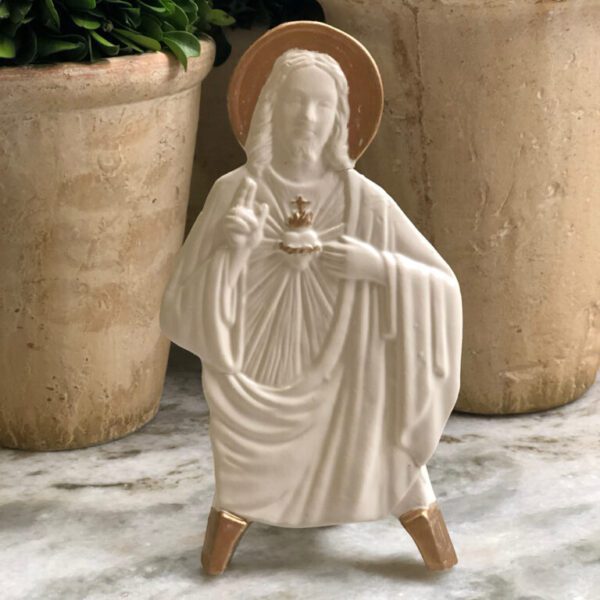 Jesus Christ figurine on easel